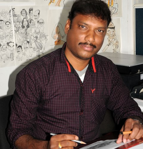 Mrityunjay-Cartoonist-working